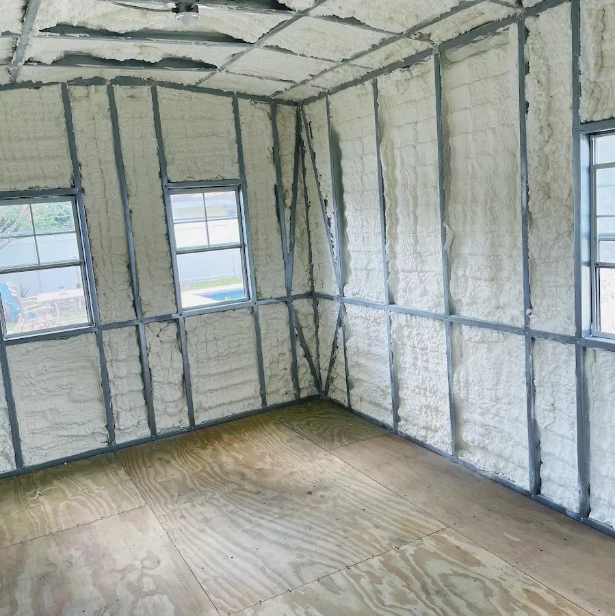 Closed-cell spray foam insulation applied to wall cavities in a residential project in Hebron